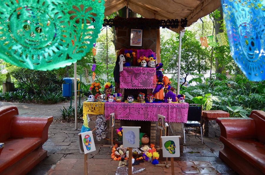 An ofrenda with papel picado and marigolds (Coyoacán, Mexico City)